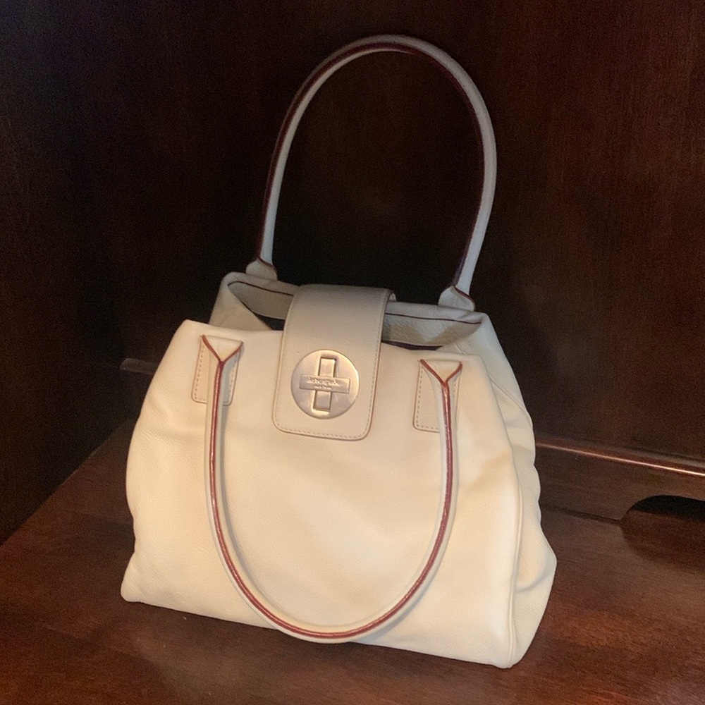 Next to new Kate Spade cream coloured handbag with red piping and gold hardware